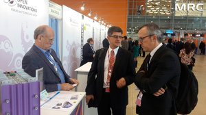 Prof. Yury Gogotsi, Drexel University (USA), and prof. Patrice Simon, Paul Sabatier University (Toulouse, France) near the exibition stand of TEEMP LLC Company