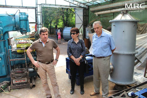  At the photo from left to right: S.Saenko (KIPT),  I.Tomashevskaya (STCU), M.Gubinskiy (DMetAU) observed equipment, manufactured due to the research and development project, MRC work premises, August 2013   