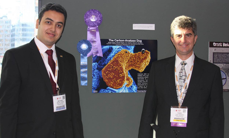 Michael Naguib and prof. Yury Gogotsi at the winning Ceramographic  poster The Carbon-Anatase Dog, Roland B. Snow Award from the American Ceramic Society. Otober 2013, Montreal, Quebec, Canada