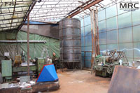 In the workshop premises, parts of manufactured equipment