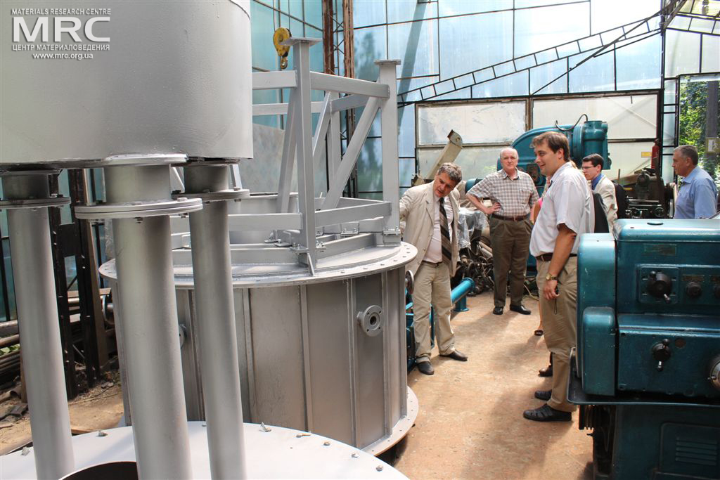 Project participants at MRC work premises observed equipment manufactured by MRC. From left to right: O.Gogotsi, Director of Materials Research Centre, STCU’s Deputy Executive Director (USA) Vic Korsun, Igor Barsukov (American Energy Technologies Company, USA), Andrew Castiglioni (Argonne National Laboratory, USA), project manager M.Gubinskyi (NMetAU), Materials Research Centre, August 2013 