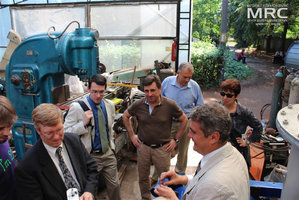  Inspecting the control units for auxilliary equipment, manufactured by MRC. from left to right: T. Moshnyaga (MRC), project technical monitor Dave Carter and Andrew Castiglioni (Argonne National Laboratory, USA), O.Gogotsi, MRC Director, project manager S.Saenko (KIPT),  project manager M.Gubinskyi (NMetAU),  I.Tomashevskaya (STCU), Materials Research Centre, August 2013  